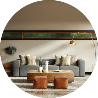 Modern living room furniture arrangement with sofa, centre table, and two square poufs on a carpet